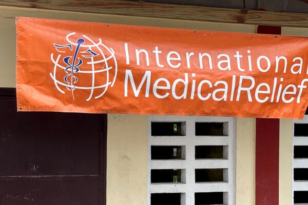 IMR banner outside clinic in Haiti